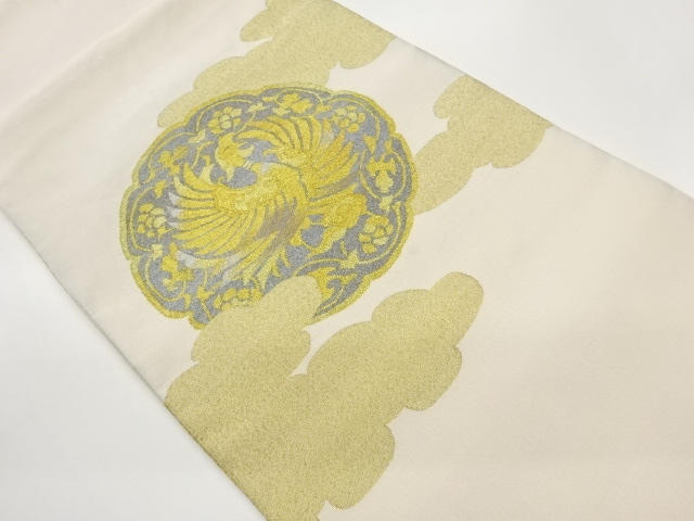 Nagoya obi, woven with cloud and mirror lining and phoenix design in tsuzure
